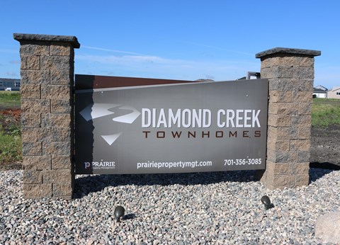 exterior sign, property sign, diamond creek townhomes